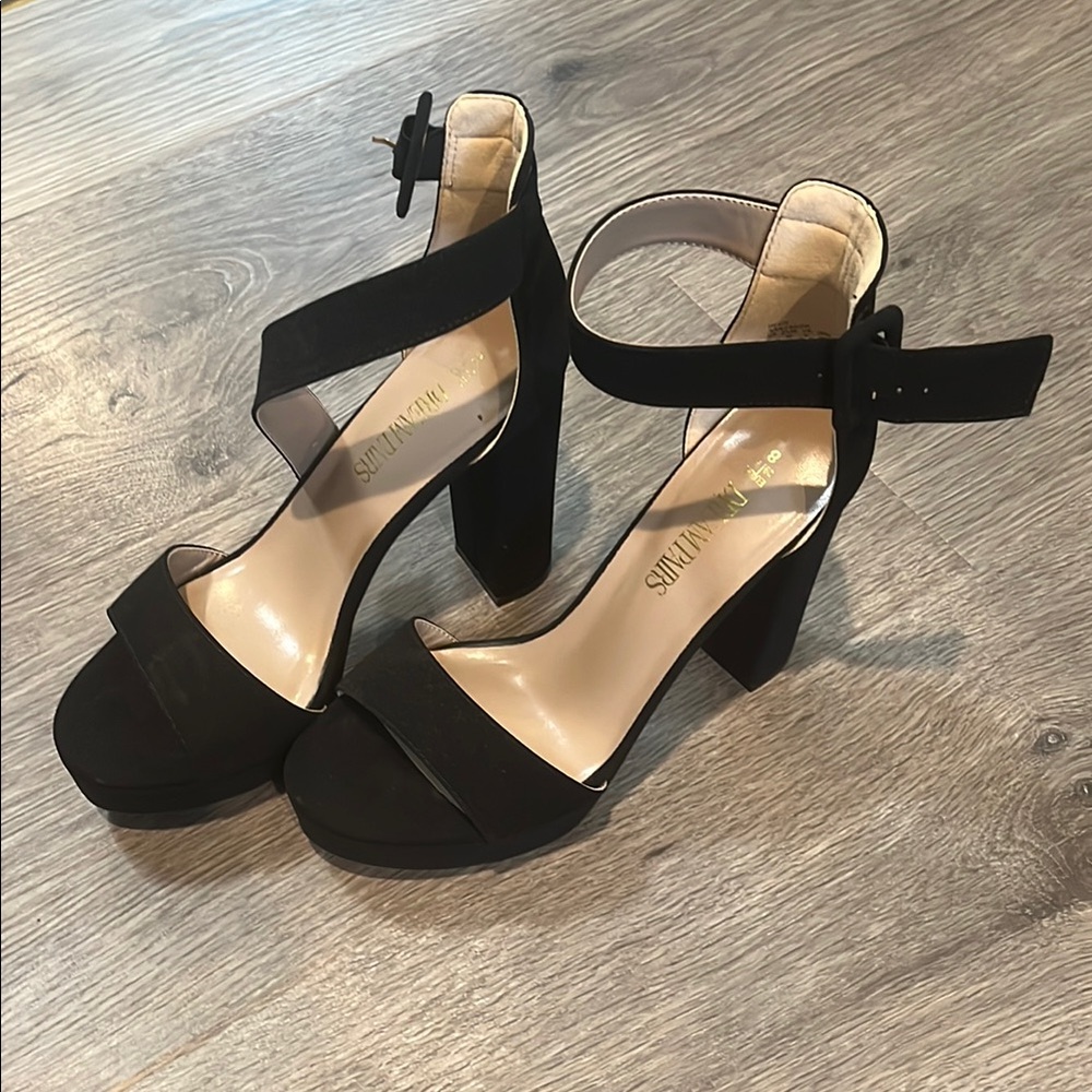 Women’s black heels. Size 8.